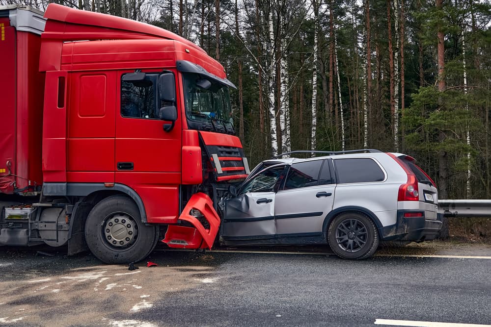 Car after a collision with a heavy truck