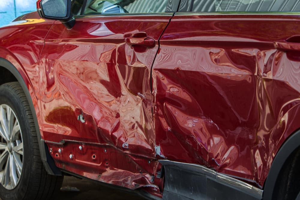 The body of the car is damaged as a result of an accident.