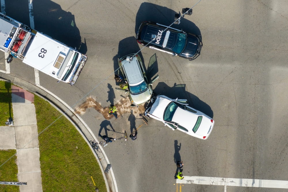 Aerial view of multi vehicle crash scene showing evidence collection for California car accident lawsuit